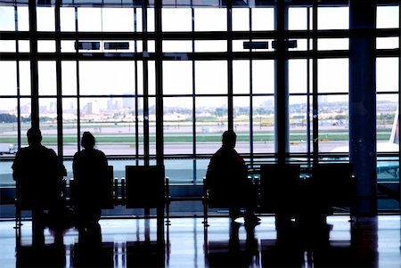 simsearch:400-05102753,k - People waiting at the international airport terminal Stock Photo - Budget Royalty-Free & Subscription, Code: 400-04936923