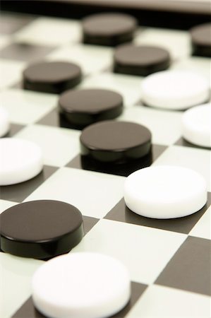 draughs or checkers black and white board game Stock Photo - Budget Royalty-Free & Subscription, Code: 400-04937085