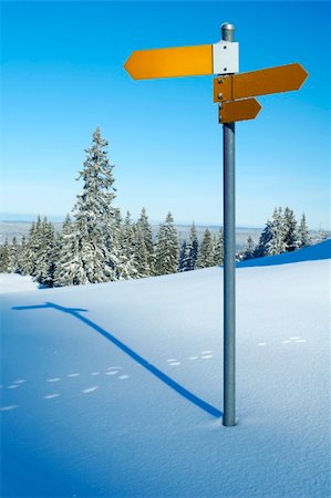 footprint winter landscape mountain - An isolated signpost, in snowy mountains, space for text on the sign, or in the sky. Stock Photo - Budget Royalty-Free & Subscription, Code: 400-04937106