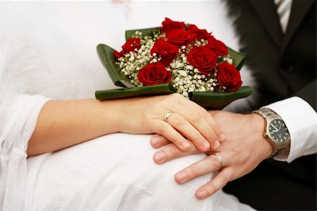 simsearch:400-04574409,k - Detail of hands of wedding couple with wedding bouquet Stock Photo - Budget Royalty-Free & Subscription, Code: 400-04937385