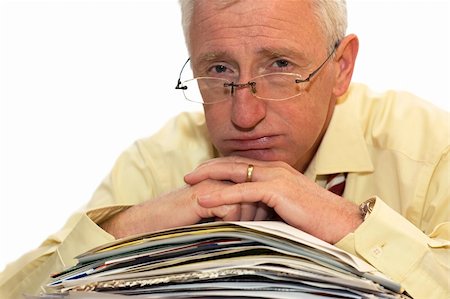 simsearch:640-03264416,k - An exhausted businessman has had too much of his paperwork. Photographie de stock - Aubaine LD & Abonnement, Code: 400-04937783