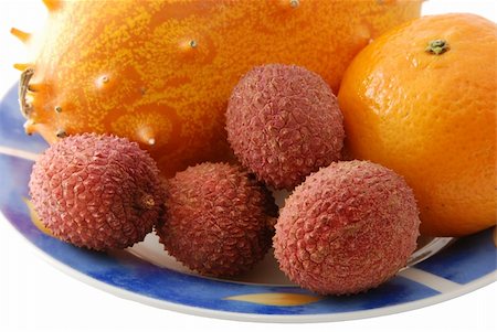 simsearch:400-07613620,k - Fresh tropical fruit on a plate Stockbilder - Microstock & Abonnement, Bildnummer: 400-04937913