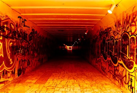 underground tunnel; red, white black colours; blurred figures in background Stock Photo - Budget Royalty-Free & Subscription, Code: 400-04938128