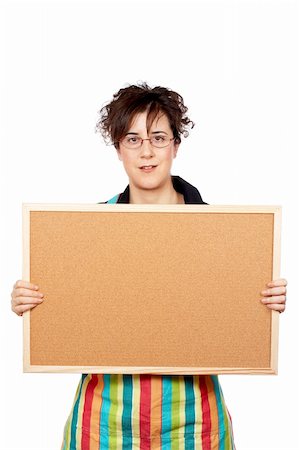 serious maid - Housewife in apron holding the empty corkboard on white background Stock Photo - Budget Royalty-Free & Subscription, Code: 400-04938559