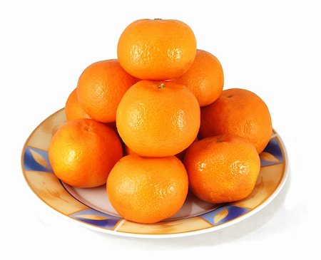 simsearch:400-07613620,k - Tangerines on a plate against white background Stockbilder - Microstock & Abonnement, Bildnummer: 400-04938814