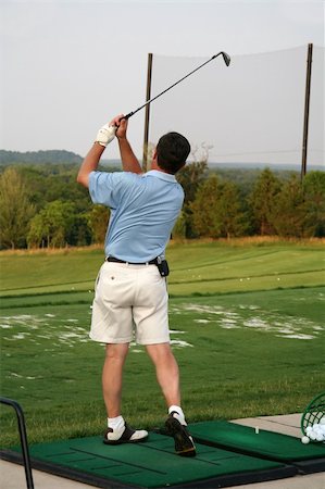 simsearch:400-05038623,k - Golfer at Driving Range Stock Photo - Budget Royalty-Free & Subscription, Code: 400-04939166