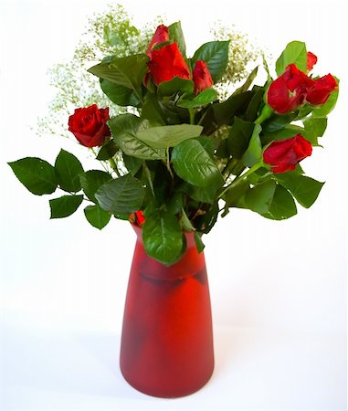 simsearch:400-04480877,k - Vase of red roses against a white background Foto de stock - Royalty-Free Super Valor e Assinatura, Número: 400-04939488