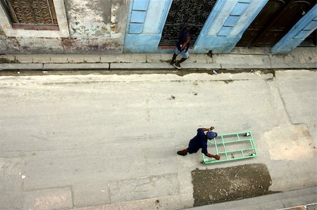 Single man walking in the street of la Havana Stock Photo - Budget Royalty-Free & Subscription, Code: 400-04939538