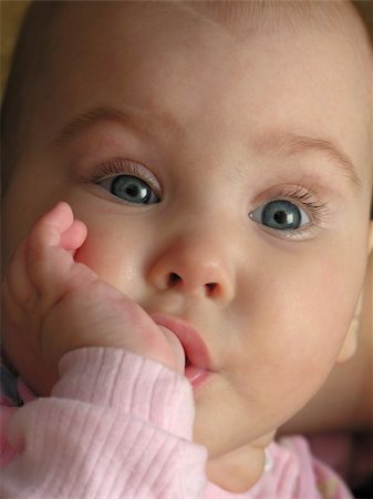 paha_l (artist) - Face Baby Suckle Finger Stockbilder - Microstock & Abonnement, Bildnummer: 400-04939858