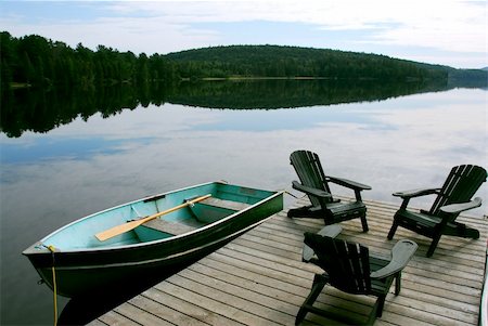 simsearch:400-03929357,k - Three wooden adirondack chairs on a boat dock on a beautiful lake in the evening Foto de stock - Super Valor sin royalties y Suscripción, Código: 400-04939885