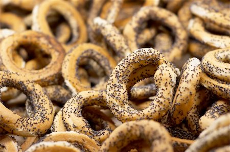 people eating bagels - bagels with poppy seeds, shallow dos, copy space. Photographie de stock - Aubaine LD & Abonnement, Code: 400-04933142