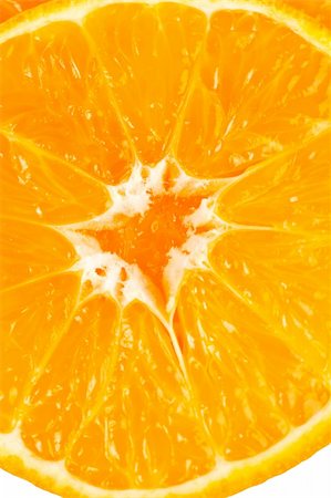 Orange slices closeup over a white background Stock Photo - Budget Royalty-Free & Subscription, Code: 400-04933186