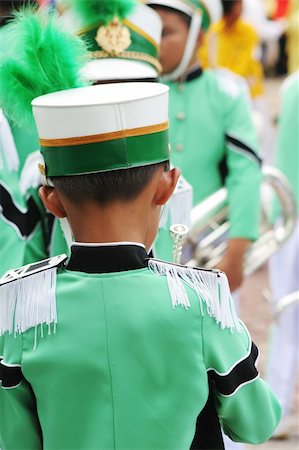 Young band member in a green uniform before a performance Stock Photo - Budget Royalty-Free & Subscription, Code: 400-04933227