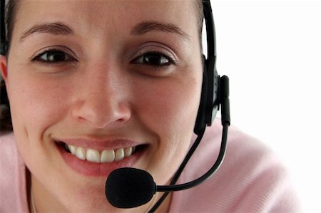 simsearch:400-03914864,k - Young Woman with Headset on a White Background Stock Photo - Budget Royalty-Free & Subscription, Code: 400-04933307