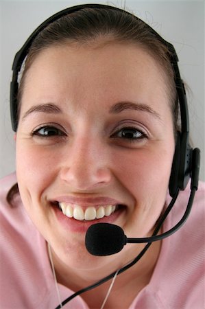 simsearch:400-03914864,k - Young Woman with Headset Read to Communicate Stock Photo - Budget Royalty-Free & Subscription, Code: 400-04933308