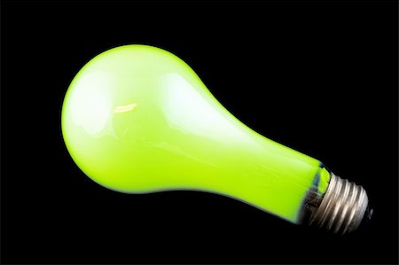 simsearch:640-01354128,k - Bright Green Light Bulb on Isolated Black Background Photographie de stock - Aubaine LD & Abonnement, Code: 400-04933316