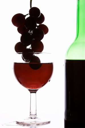 Red wine and grapes in wihte background. Stock Photo - Budget Royalty-Free & Subscription, Code: 400-04933412