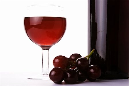 Red wine and grapes in wihte background. Stock Photo - Budget Royalty-Free & Subscription, Code: 400-04933413
