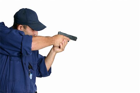 security guard (male) - Officer using a weapon during duty or wepons handling training, white background, space for text Stock Photo - Budget Royalty-Free & Subscription, Code: 400-04933855