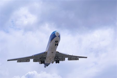 s23 (artist) - Plane in the blue sky Photographie de stock - Aubaine LD & Abonnement, Code: 400-04933857