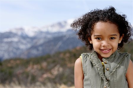 studio1one (artist) - Cute little girl doing fashion photo shoot in a mountains Foto de stock - Royalty-Free Super Valor e Assinatura, Número: 400-04944423