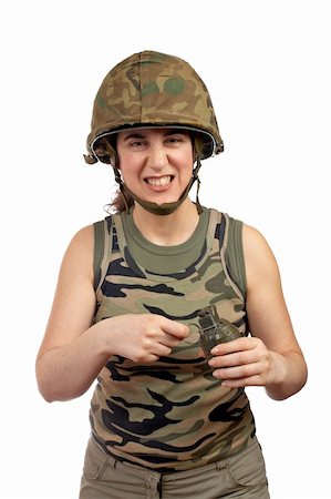 A beautiful soldier girl holding a hand grenade on white background Stock Photo - Budget Royalty-Free & Subscription, Code: 400-04944551