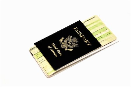 Passport and airline ticket isolated in a white background Stock Photo - Budget Royalty-Free & Subscription, Code: 400-04944892