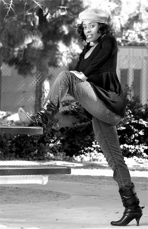 Portrait of African-American girl  in jeans and boots Photographie de stock - Aubaine LD & Abonnement, Code: 400-04945147