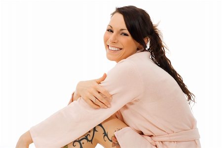 simsearch:400-03912893,k - cute and young brunette dressing pink bathrobe with a tattoo on her leg Foto de stock - Super Valor sin royalties y Suscripción, Código: 400-04945239