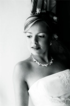 Portrait of the smiling beautiful bride. b/w+blue tone Stock Photo - Budget Royalty-Free & Subscription, Code: 400-04945814