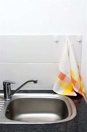 Sink in a modern new kitchen. Stock Photo - Budget Royalty-Free & Subscription, Code: 400-04945939