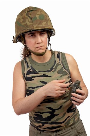 A serious soldier girl holding a hand grenade on white background Stock Photo - Budget Royalty-Free & Subscription, Code: 400-04945972