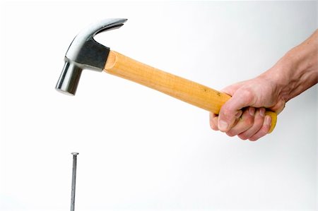 simsearch:600-00551134,k - A claw hammer , hammering in a nail Stock Photo - Budget Royalty-Free & Subscription, Code: 400-04946055