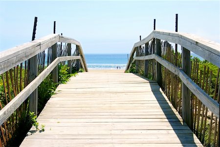 elevated pedestrian walkways - Wooden path over sand dunes with ocean view Stock Photo - Budget Royalty-Free & Subscription, Code: 400-04946165