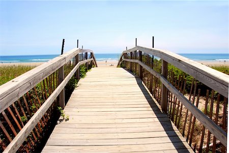elevated pedestrian walkways - Wooden walkway over dunes with ocean view Stock Photo - Budget Royalty-Free & Subscription, Code: 400-04946482