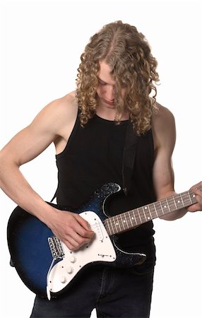 A young man playing guitar Stock Photo - Budget Royalty-Free & Subscription, Code: 400-04946678