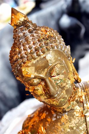 simsearch:400-05010927,k - Close-up of a gold Buddhist statue in Thailand - travel and tourism Foto de stock - Royalty-Free Super Valor e Assinatura, Número: 400-04946824