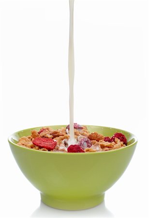 simsearch:400-03917186,k - A bowl of cornflakes with fruits and milk being poured. Shallow DOF Stock Photo - Budget Royalty-Free & Subscription, Code: 400-04946978