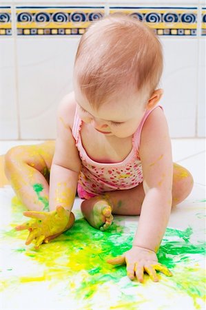 cute little baby playing with colorful paints Stock Photo - Budget Royalty-Free & Subscription, Code: 400-04947149