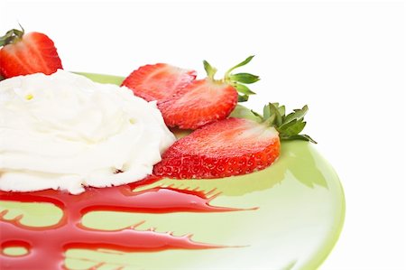 simsearch:400-04677383,k - Dessert of strawberries with cream, on green dish. Shallow DOF Stock Photo - Budget Royalty-Free & Subscription, Code: 400-04947213