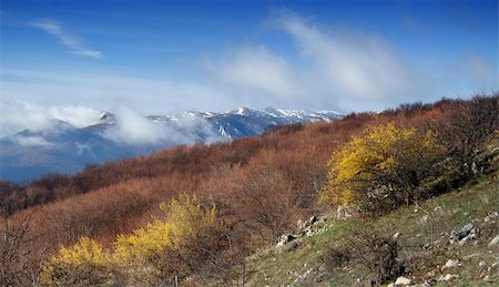 simsearch:400-04277308,k - Spring mountains landscape. Clouds and mountain silhouettes Photographie de stock - Aubaine LD & Abonnement, Code: 400-04949549