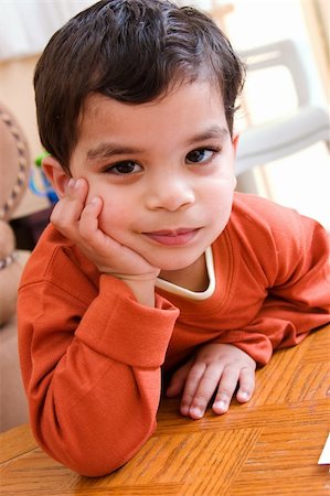 A child with a real mischievous look on him. Stock Photo - Budget Royalty-Free & Subscription, Code: 400-04949720