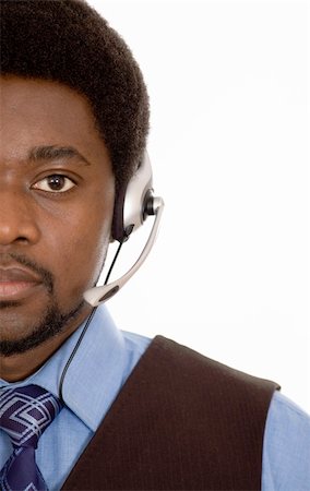 simsearch:400-03914864,k - This is an image of a man with a microphone headset on. This image can be used for telecommunication and service themes. Stock Photo - Budget Royalty-Free & Subscription, Code: 400-04949799