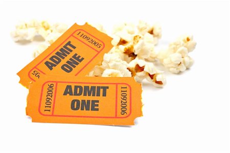 simsearch:400-04913050,k - Popcorn and two tickets on white background with soft shadow. Shallow DOF Photographie de stock - Aubaine LD & Abonnement, Code: 400-04949890