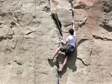 simsearch:400-07902631,k - Rock Climbing a 5-10a route in Billings, Montana. Photographie de stock - Aubaine LD & Abonnement, Code: 400-04940016