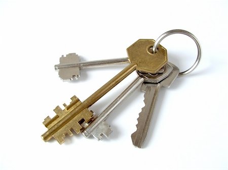 simsearch:400-03972507,k - bunch of keys from door locks on white background Stockbilder - Microstock & Abonnement, Bildnummer: 400-04940019
