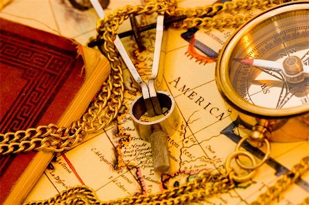 simsearch:700-00478820,k - Old style brass compass on antique  map Photographie de stock - Aubaine LD & Abonnement, Code: 400-04940085