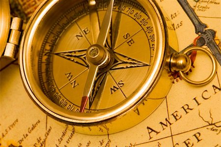 simsearch:700-00478820,k - Old style brass compass on antique  map Photographie de stock - Aubaine LD & Abonnement, Code: 400-04940089