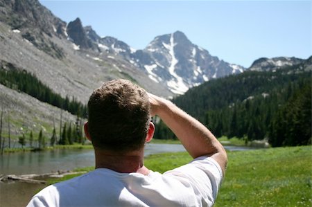 Day hiker catching a glimpse of Whitetail Peak, Montana. Stock Photo - Budget Royalty-Free & Subscription, Code: 400-04940229