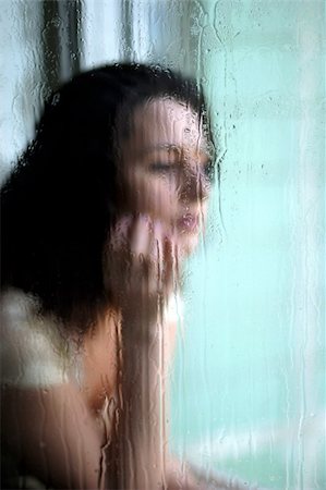 simsearch:400-04479015,k - The girl looking out of the wet window Stock Photo - Budget Royalty-Free & Subscription, Code: 400-04940491